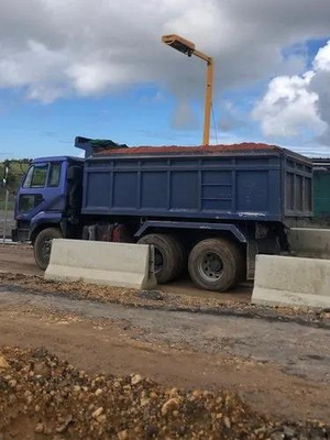 Truck cargo volume being measured by an overhead sensor